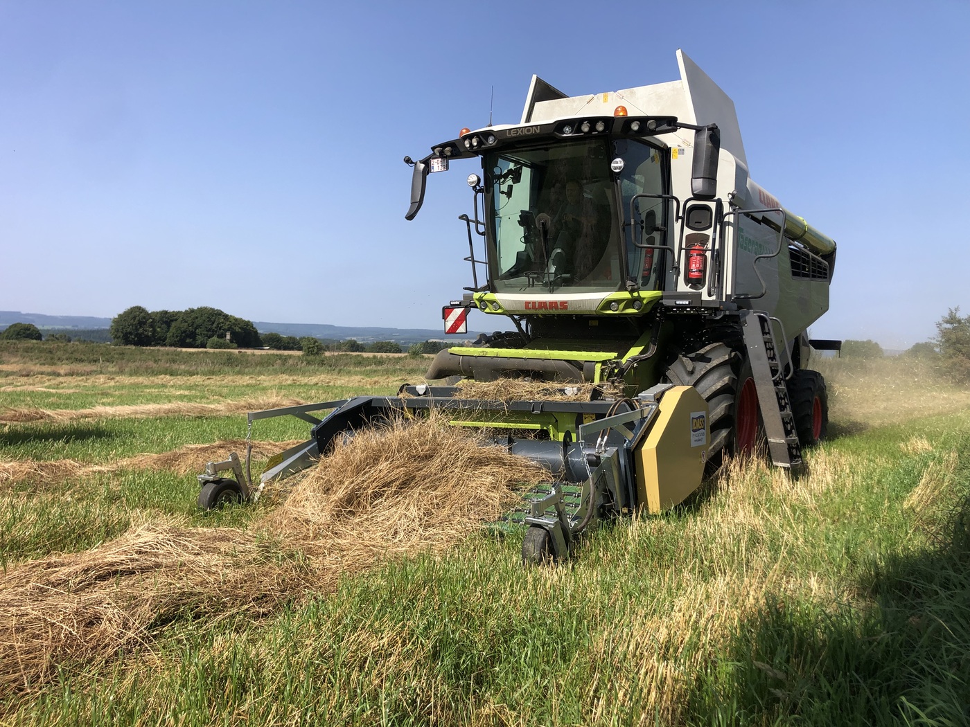 Moissonneuse-batteuse Claas Lexion Taserag en récolte de céréales